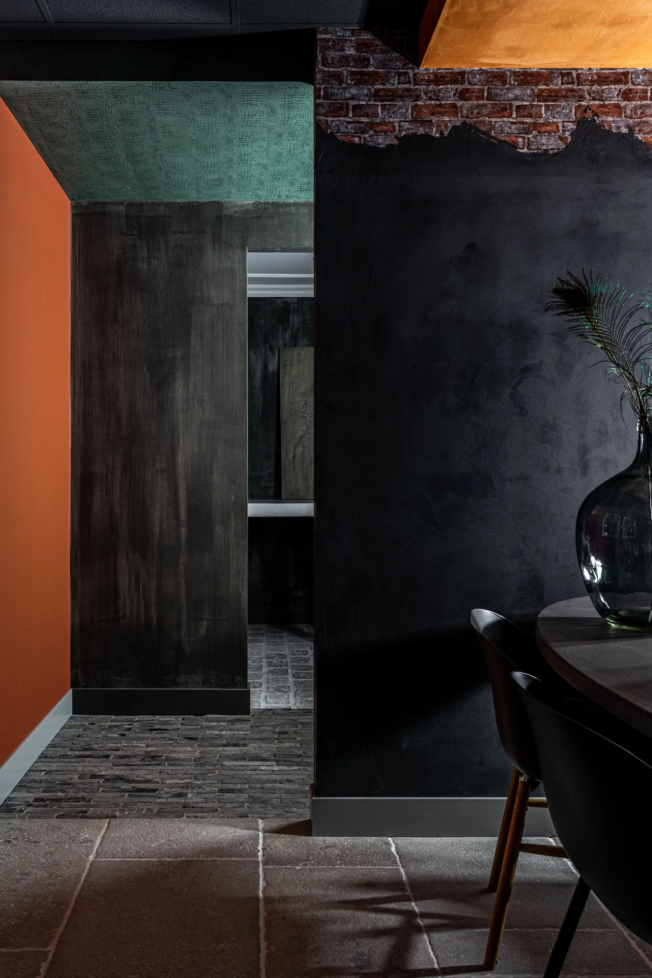 Carbon black textured walls in a dramatic interior