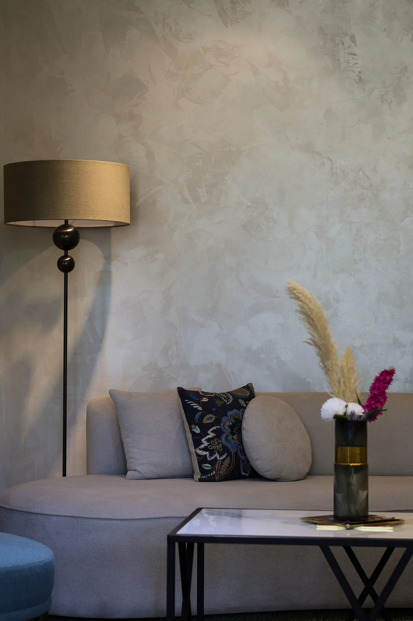 Soft greige plaster wall in a tailored living room