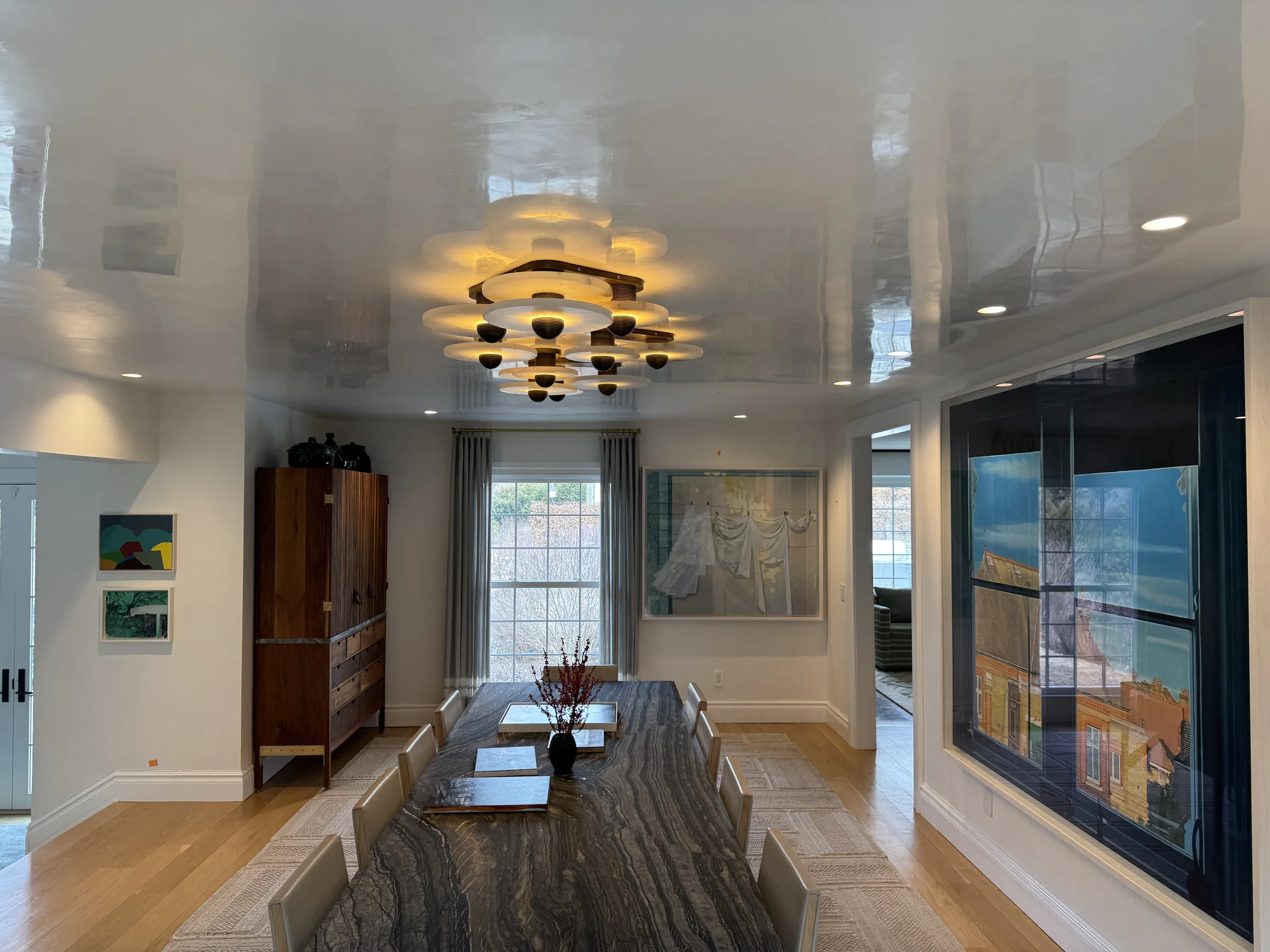 Reflective ceiling finish above a Greenwich dining room