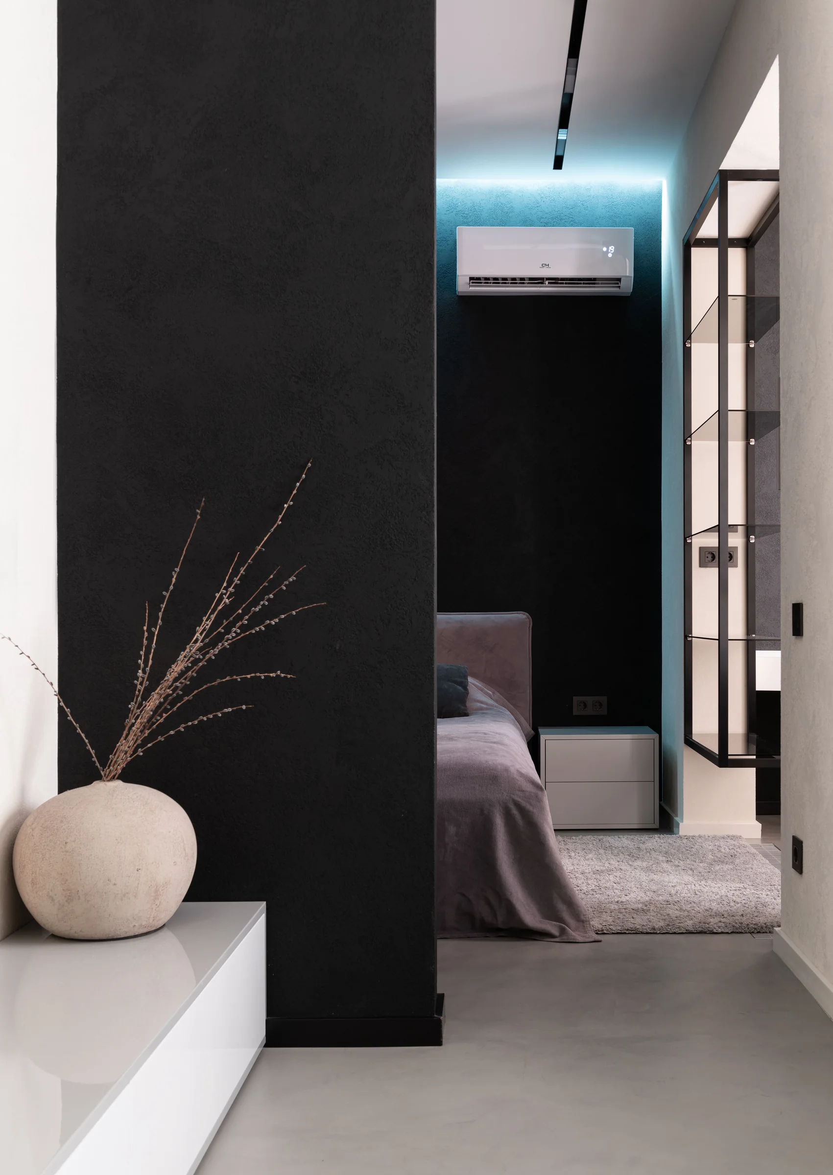 Deep matte finish behind a bed
