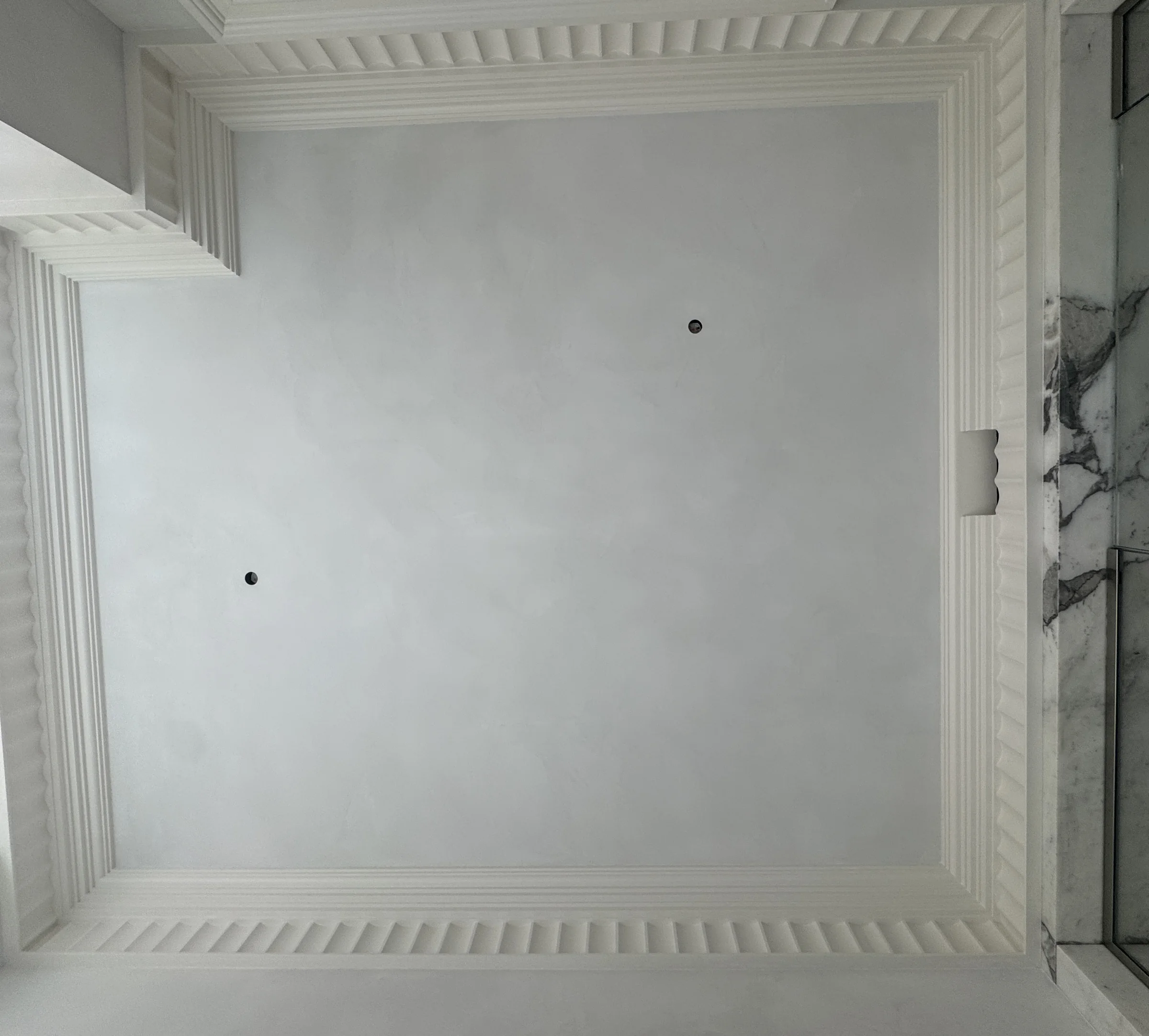 Pale hand-applied mineral ceiling on the Upper East Side